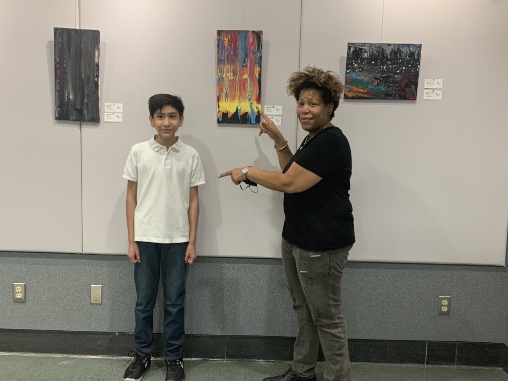Art instructor Lisa Jones with budding art student
