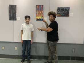 Art instructor Lisa Jones with budding art student