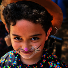 Little dancer gets face painted for performance