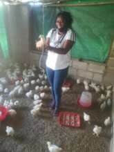 Eunice at her poultry house