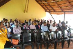 Cohort 5 graduates proudly seated.