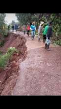 A rural road in Honduras washed away by rain