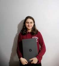 Sevcan with her new laptop computer