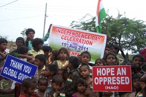 CHILDREN SALUTING OUR NATIONAL FLAG