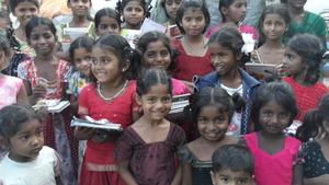 happy and cheerful children after receiving needs