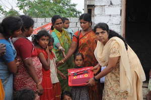 GIRL CHILD RECEIVING NEEDS FROM ADMIN.CO-ORDINATOR