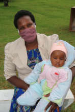Mother and baby waiting for vaccination services