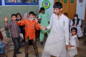 Children are dancing during the fun activity