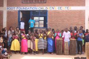 Children performing dance at the previous center
