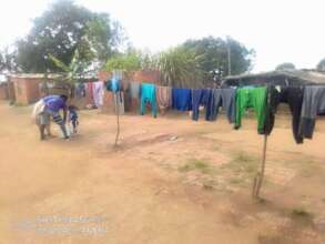 Hanging clothes out to dry- Laundry Thursdays