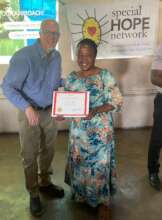 Eric Nelson with graduate