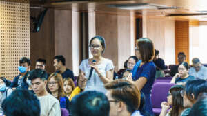 A student from UEF speaking with Ms. Kelly Vo