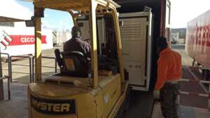 Off-grid box being loaded to the ship