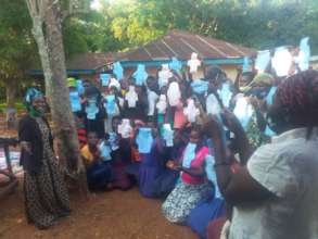 Participants display their first reusable pads