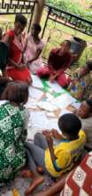 Girls learning to make reusable pads