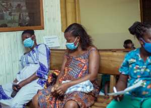Women in the waiting room at the Madina Polyclinic