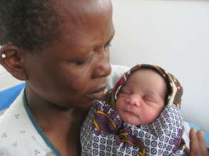Newborn baby with mum