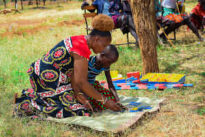 Mentor teacher Gladys during community meeting