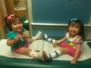 Charlet and sister Laila with their braces