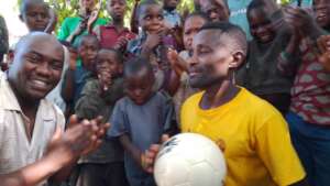 Happy Coach With New Ball