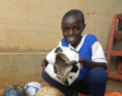 Bring Soccer Balls To 100 Rwandan Boys and Girls