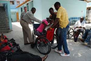 Student receiving a new wheelchair