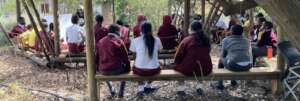 Alumni facilitators teaching the Outdoor Classroom