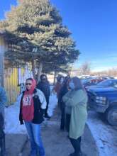 Community members waiting for their packages!