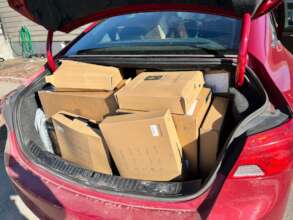 Packing the car up for mutual aid distribution!