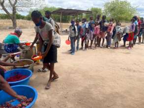 Cooks serving lunch in Cumba School