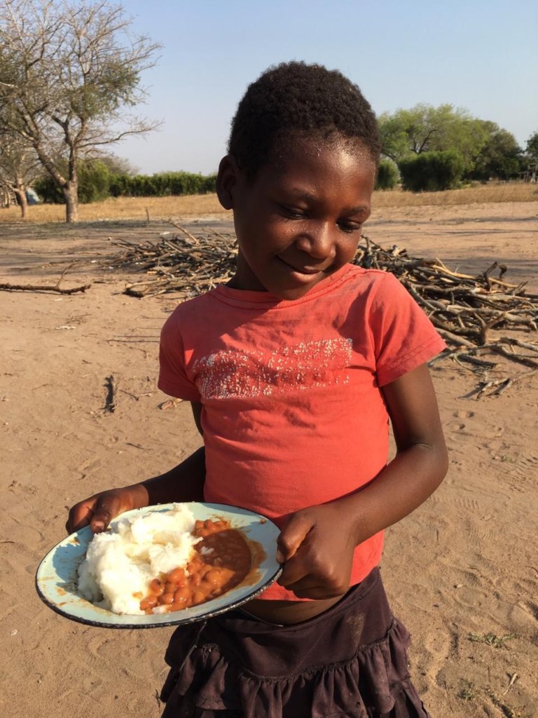 A student receiving her school lunch