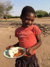 A student receiving her school lunch