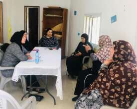 Fatma & Nejmah with mothers of Jubb al Dhib School