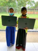 Indigenous girls working with their Laptops