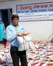 Our Chairman Mr Deepak Kumar helping to give food