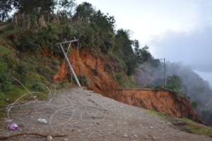 Road washed away by a landslide