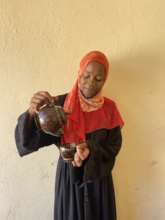 Fatma with coconut products