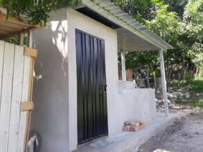 completed latrine/pila project for local school