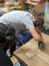 Woody certifying Ilya on the CNC macine