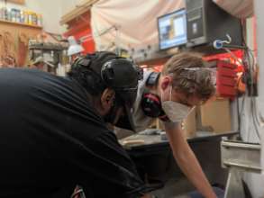 Woody certifying Ilya on the CNC macine