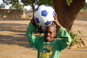Happy ball recipient, Lusaka