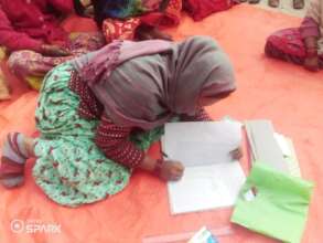 Women's group secretary taking meeting notes