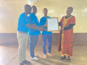 Handing over the project to the school