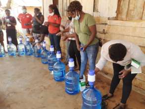 Distribution of water bottles and Water hand press