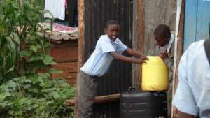 Student fetching water.