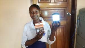 Mariama with her new solar light