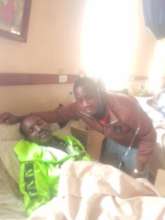 Fred in his sick bed at the hospital