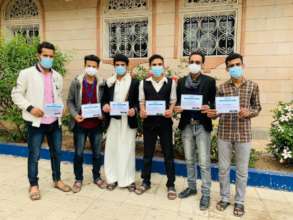 Holding the certificates in yard of institute