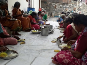 Eldely women having nutritious meal at oldage care