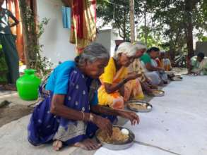 Giving food donation for poor senior citizens dona